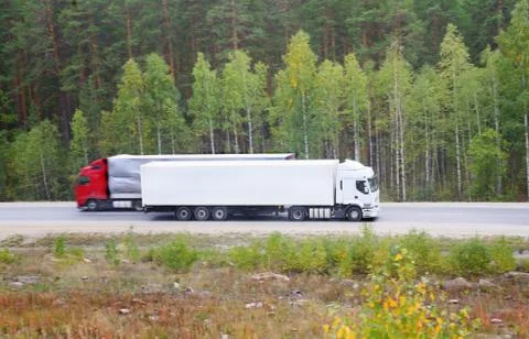 Two trailers go on the way Stock Photos