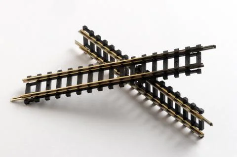 Two train rails on white background Stock Photos