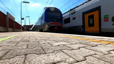 Two trains leaving the train station Stock Footage 138444642
