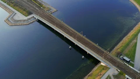 Two trains passing on bridge, drone stock footage by DroneRune Stock Footage 128077055