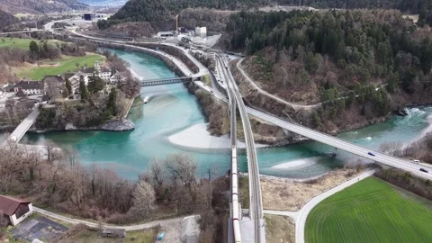 Two Trains Passing on Double Railway Bridge Over Rhine River Aerial 스톡 동영상 330749514