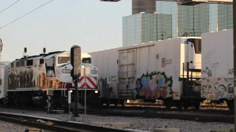 Two trains passing on railroad bridge Video stock 49685672