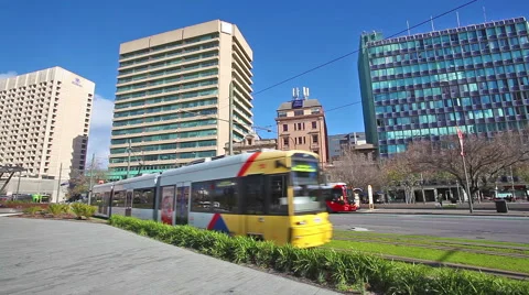 Two trams passing by in the downtown area of Adelaide, South Australia Stock Footage 40105874