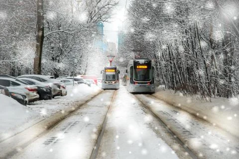 Two trams in snowfall Stock Photos