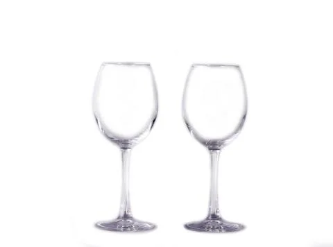 Two transparent empty glasses on a long leg Stock Photos