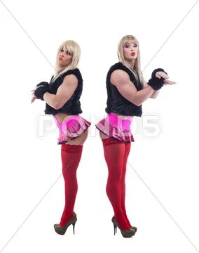 Two transvestites posing in white go-go wigs Stock Photos