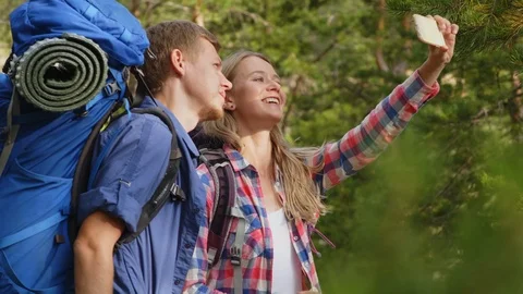 Two trekkers trying to make nice selfie photo Stock Footage 118546850