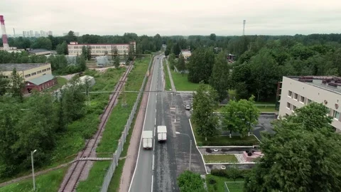 Two trucks are driving on the road. Overtaking. Aerial view 動画素材 146589100