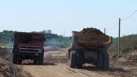 Two trucks meet on the impassable road Stock Footage 71341042