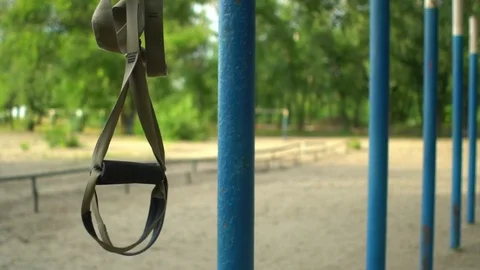 Two trx loops for exercising outdoors close up Stock Footage 77513246