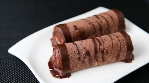 Two tubes with cream - dessert Stock Footage 57661047