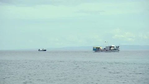 Two tugboats float in the waters of Bajkal in a summer morning Stock Footage 81041554