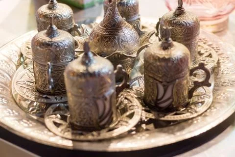 Two Turkish coffee cups with silver and copper covers Stock Photos