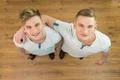 The two twin brother look to the camera. View from above Photo