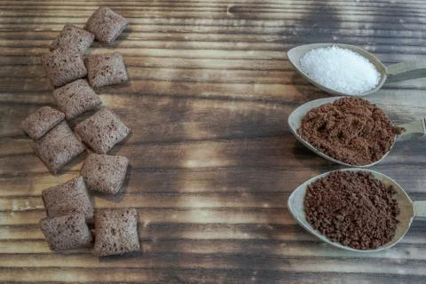 Two types of cafe sugar and cakes Stock Photos