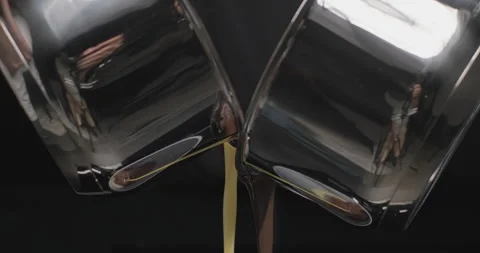 Two types of hot melted chocolate poured out of bowls. Cooking handmade Stock Footage 250237895