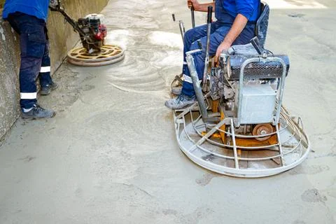 Two types of power trowel with engine, machine for finishing, leveling conc.. Stock Photos