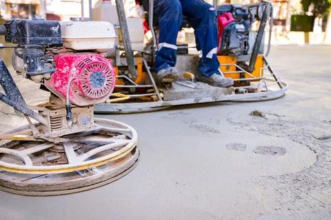 Two types of power trowel with engine, machine for finishing, leveling conc.. Foto stock