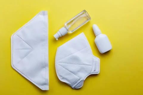 Two types of protective face masks as precaution in spread of coronavirus Stock Photos