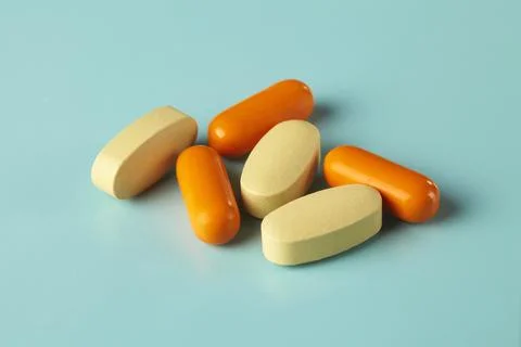 Two types of vitamins with different colours and shapes Stock Photos