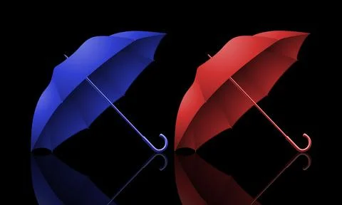 Two umbrellas on a dark background. Winter time Stock Photos