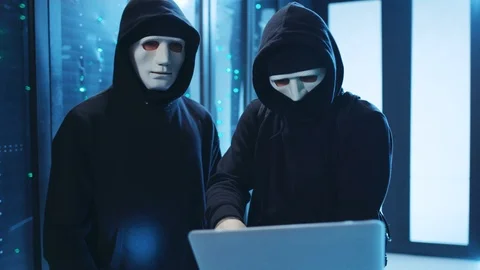 Two unexperienced hackers sneaking into database, trying to hack server system Stock Footage 120694326