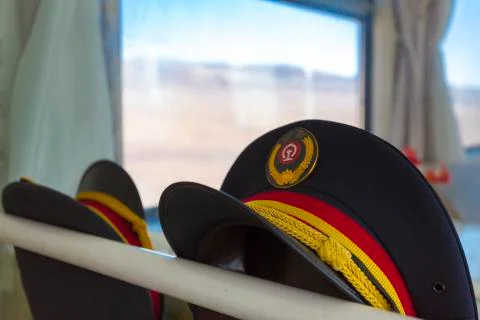 Two uniform-hats in the Train Lhasa - Shanghai Stock Photos