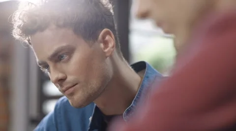 Two university students working on project together in loft modern interior 動画素材 67671808