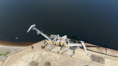 Two unloading vehicles are working at the cargo port Stock Footage 116735718