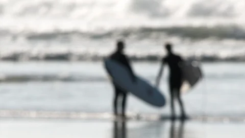 Two Unrecognizable Surfers Walking Out Soft Focus Stock Footage 121288137