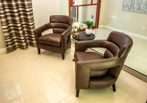 Two Upholstered U-Shaped Arm Chairs Stock Photos