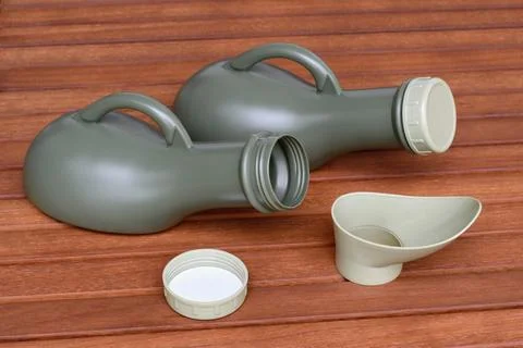Two urinal bottles for man and woman. Suitable for outdoor activities as trav Stock Photos