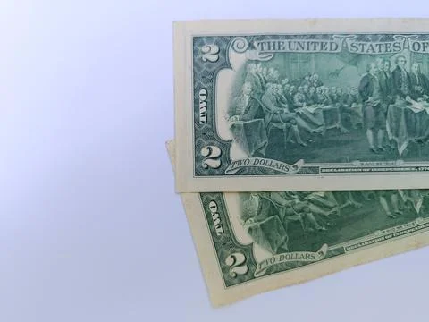 Two US 2 dollar banknotes. Two dollars. US banknotes. Business concept. Stock Photos