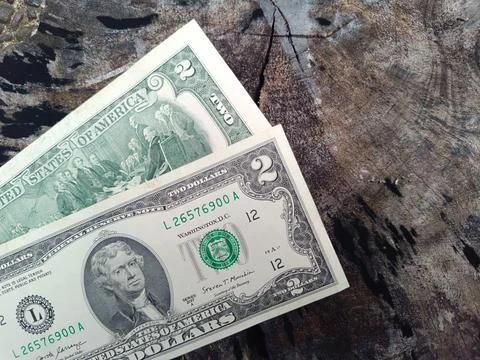Two US 2 dollar banknotes. Two dollars. US banknotes. Business concept. Stock Photos
