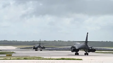 Two U.S. Air Force B-1B Lancer aircraft taxiing for take off for bomber mission Stock Footage 277571646