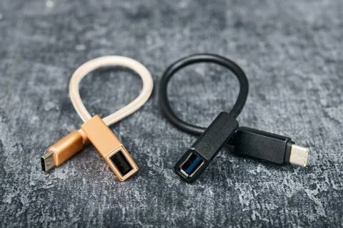 Two USB cable type A to type C, compatible for many devices, on gray backgrou Stock Photos
