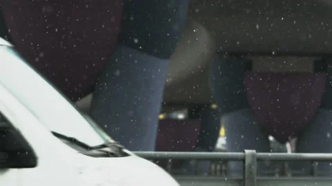 Two Vans Moving in Opposite Directions. Snowfall Stock Footage 87870804
