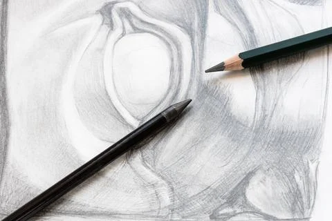 Two various graphite pencils on drawing of eye 스톡 사진