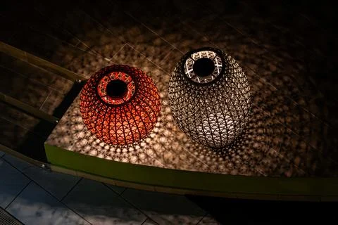 Two vases with a light shining on them Stock Photos