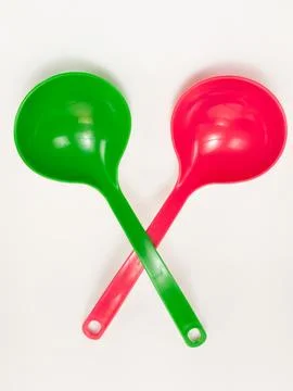 Two  vegetable spoons in two colors Stock-Fotos