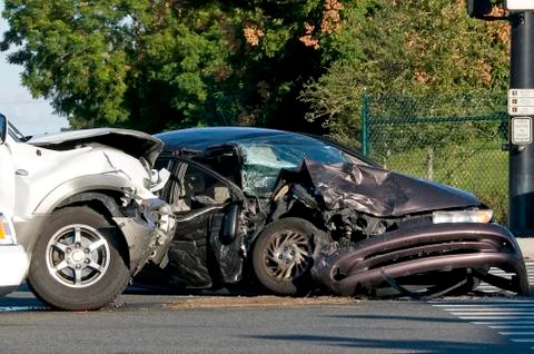 Two vehicle accident at a busy intersection Stock Photos