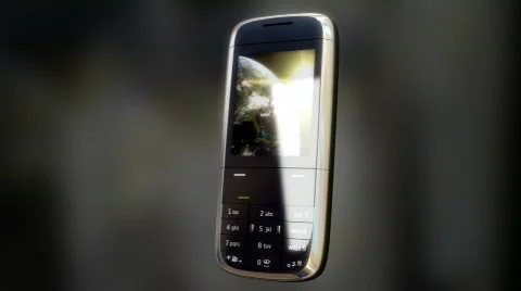 Two views of a cell phone reflecting light. Stock Footage 874502