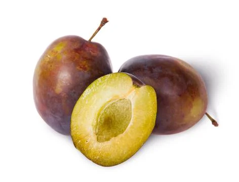 Two violet plums and half stand Stock Photos