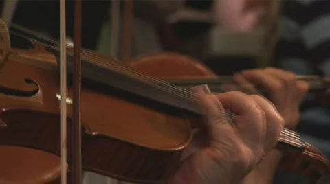 Two violins playing fast passage Stock Footage 558363
