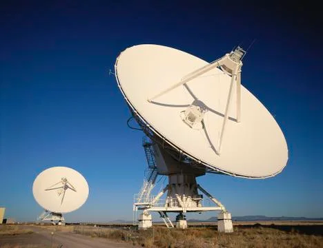 Two VLA Very Large Array radio telescope dishes facing up Stock Photos