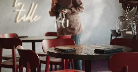 Two waiters  cleaning and serving tales in restaurant Stock Footage 237931879
