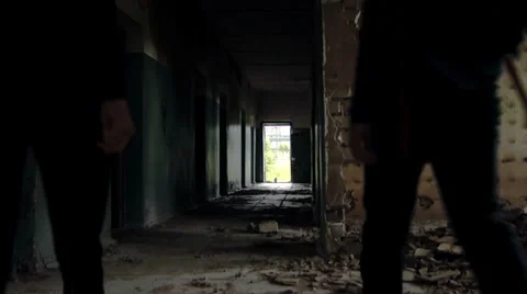 Two walk on an abandoned building Stockbeeldmateriaal 39844574