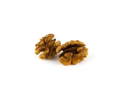 Two walnut kernels Stock Photos