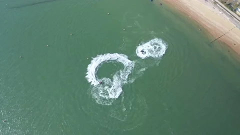 Two water scooters making circles on water surface Stock-Footage 161004388