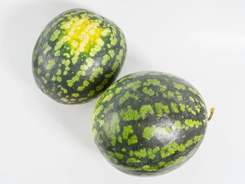 Two watermelons on white background. Stock Photos